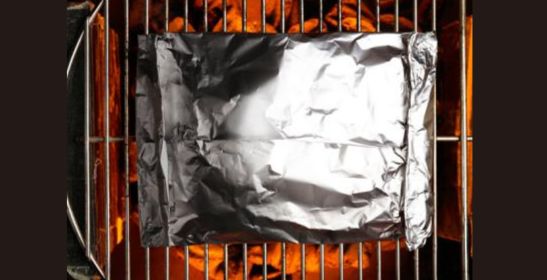 using aluminium  foil for protectin food from charcoal grill heat